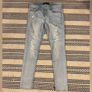 Women’s EXPRESS stonewashed jeans.